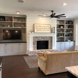 Rustic living room with fireplace and built-ins.