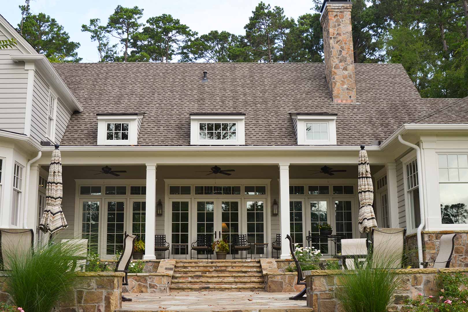 Home's back porch with stone patio.