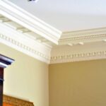 Elegant white crown molding detail.